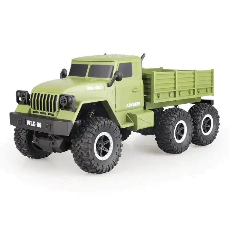 Olive green six-wheel remote control off-road truck with black tires and white rims.