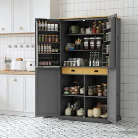 Gray pantry cabinet with wooden drawers and shelves, stocked with jars of spices and kitchenware.