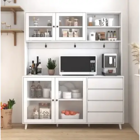 White kitchen cabinet with glass doors and drawers, featuring a microwave and coffee machine on top