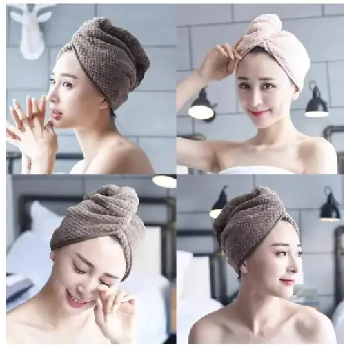 Beige knitted towel headwrap with a soft, textured fabric and a snug fit for drying hair.