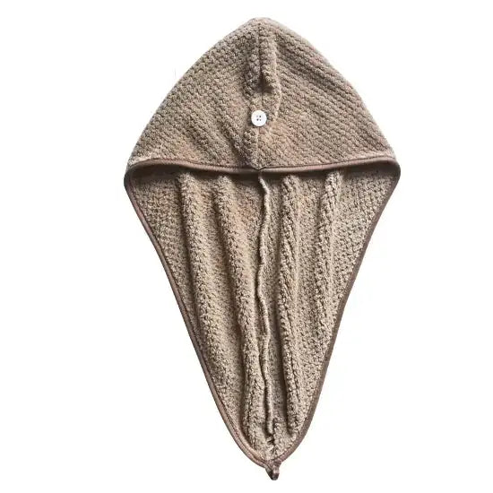 Beige textured towel hood with a single button closure.