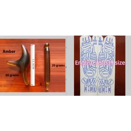 Amber massage tool with a smooth, polished surface and a warm golden-brown hue.