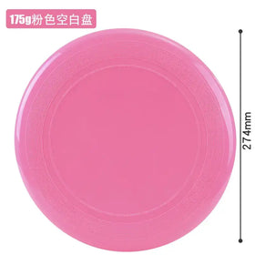 A smooth, solid pink plastic frisbee with concentric ridges around its edge.