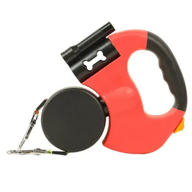 Red and black retractable dog leash with a built-in flashlight featuring a bone-shaped cutout on the handle.