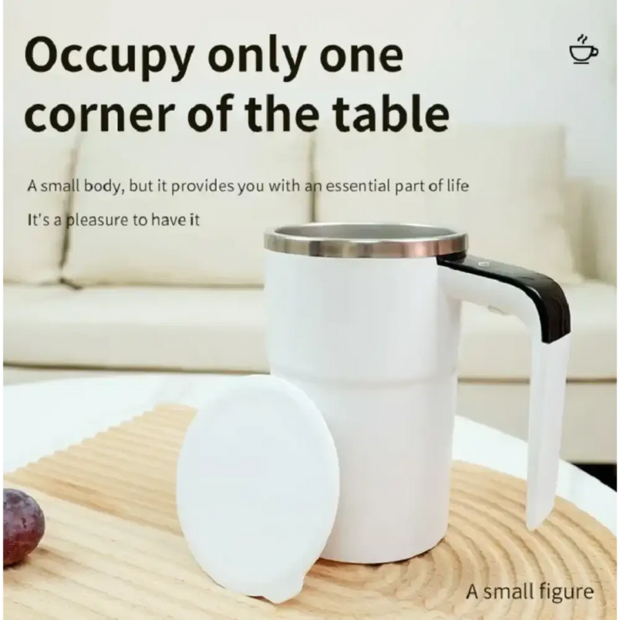White ceramic mug with a black handle and stainless steel rim, lid resting beside it