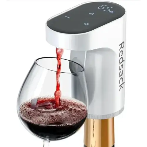 Silver and black redstack wine cooler dispenser pouring red wine into a glass.