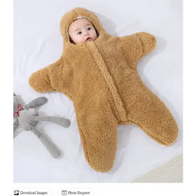 A soft, tan star-shaped baby sleeper made of plush fleece with a hood and zipper front.