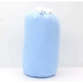 Light blue fabric travel bag with a white drawstring closure.