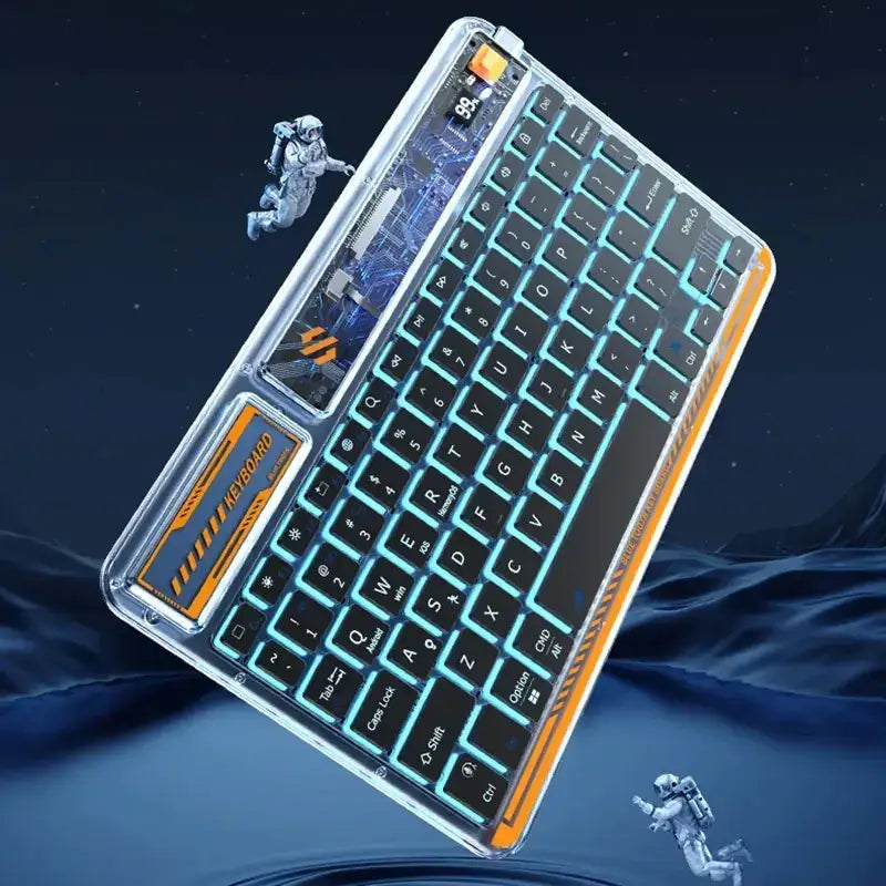 Transparent keyboard with black keys illuminated by teal backlighting, framed in clear plastic with orange accents and exposed circuitry on the side.