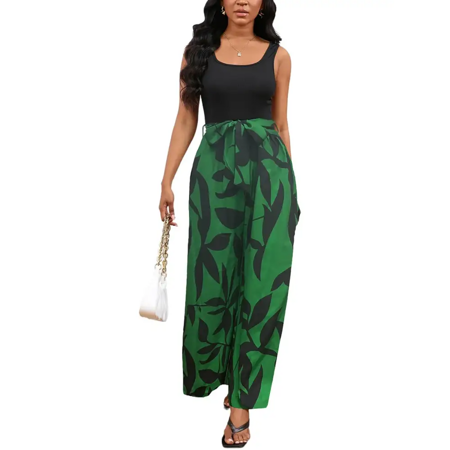Green and black leaf-patterned wide-leg pants with a tied waistband.