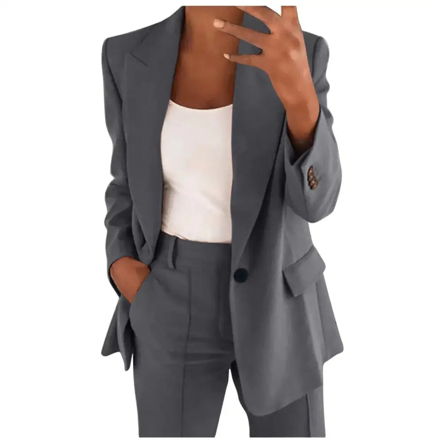 Gray blazer with a sleek, tailored fit and subtle texture.