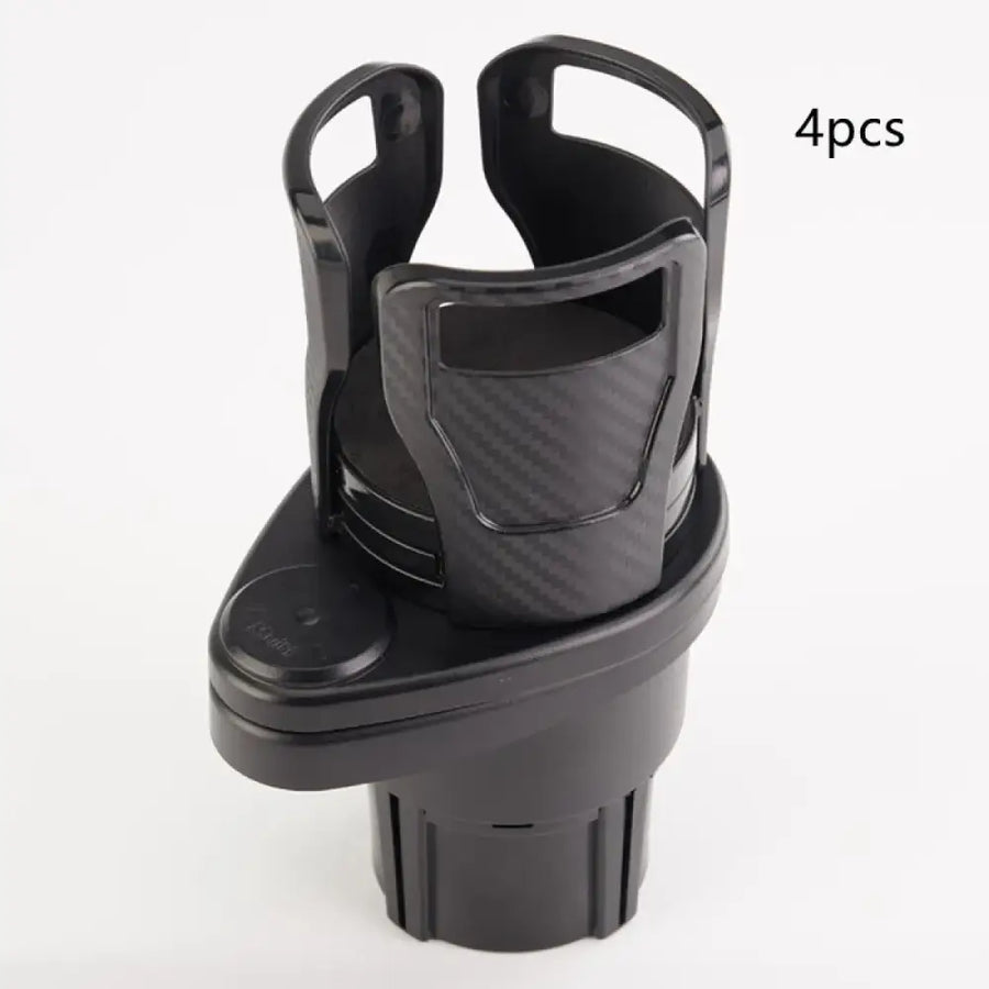 Black plastic car cup holder with a carbon fiber patterned insert.