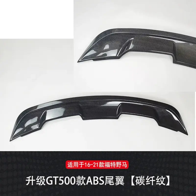 Black carbon fiber textured abs rear spoiler designed for 2016-2021 ford mustang gt500 models.