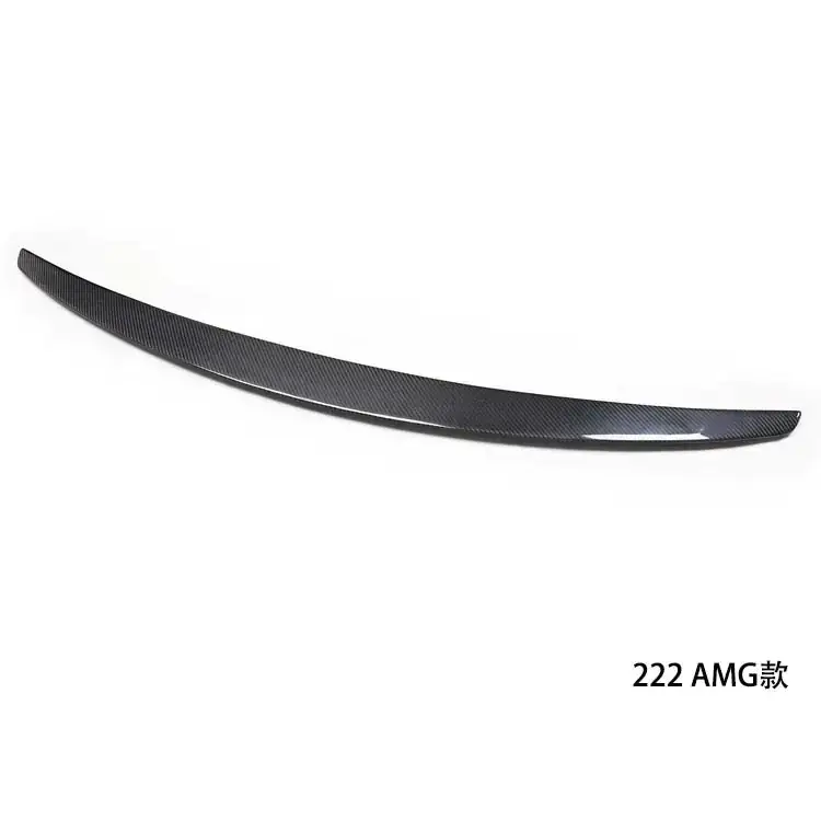 Black carbon fiber rear trunk spoiler with a sleek, curved design and glossy finish.