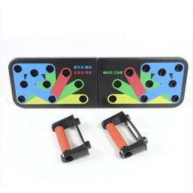 Black plastic push-up workout board with colorful zones and orange resistance handles