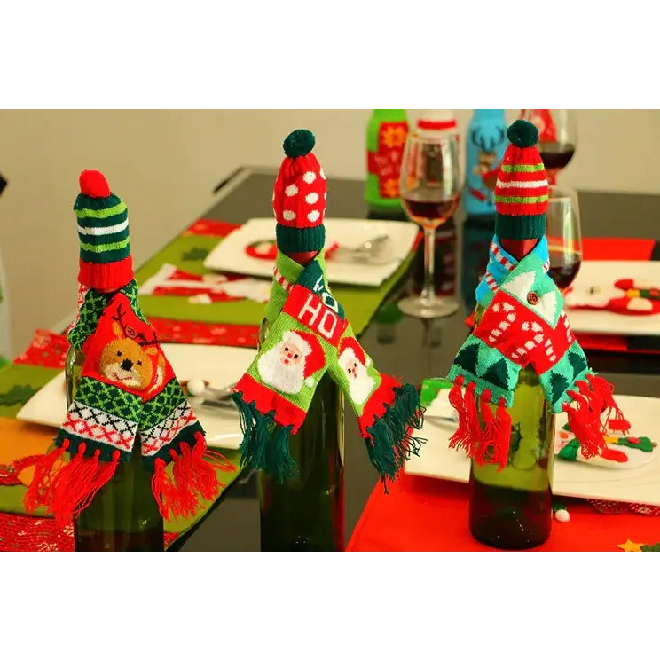 Christmas-themed knitted bottle covers with festive patterns and colorful yarn.
