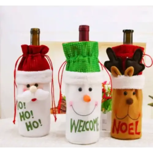 Three festive wine bottle covers featuring a santa, snowman, and reindeer design in red, green, and brown fabric with embroidered faces.