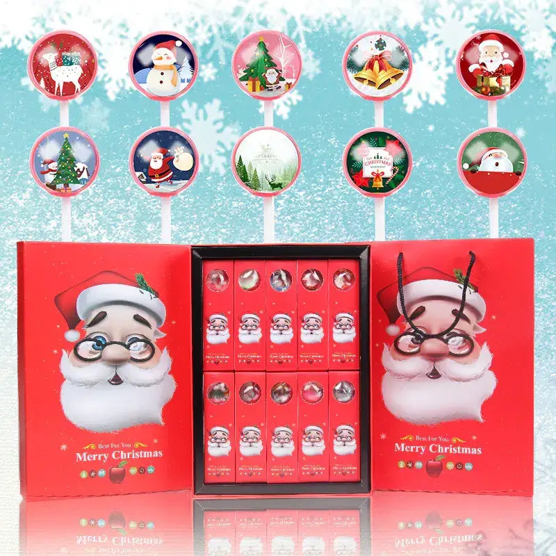 Red christmas-themed gift box featuring a cartoon santa claus design with glasses and white beard, containing twelve individually wrapped chocolate candies in clear circular windows.