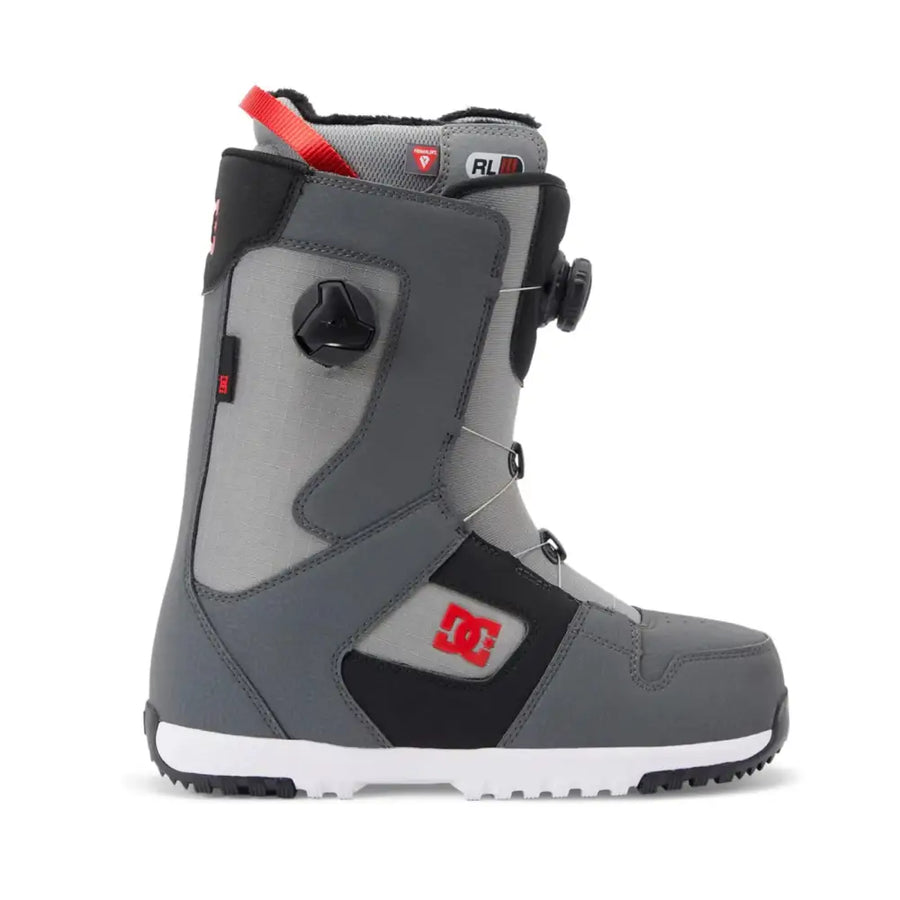 Gray and black dc snowboard boot with red accents, featuring a boa lacing system and reinforced stitching.