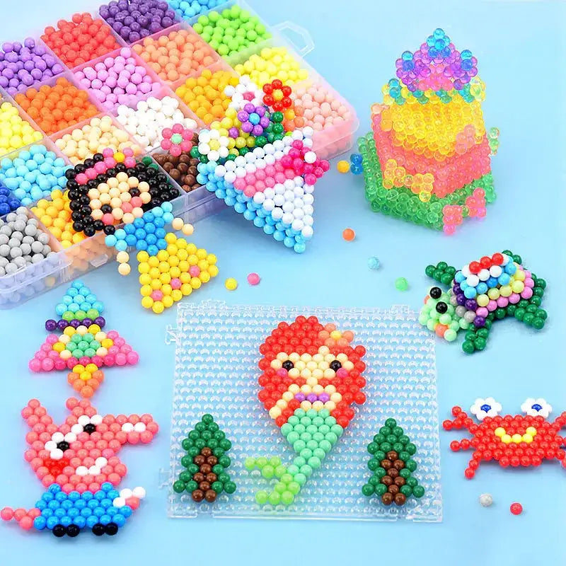 Colorful plastic bead sets arranged in a clear storage box with completed creations like mermaids, turtles, and crabs made from the beads.