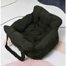 Black padded car seat cushion with a soft, quilted design and an attached handle.