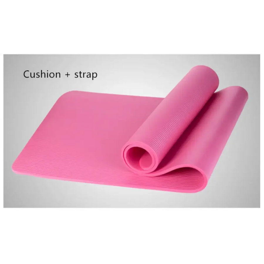 Pink yoga mat with textured surface and rolled edge.