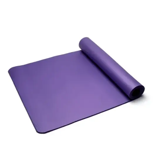 Purple yoga mat with a textured surface and rolled edge.