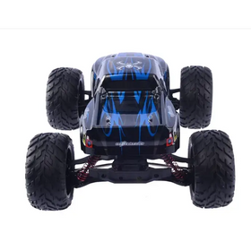 Black and blue remote-controlled monster truck with flame decals and red suspension springs.