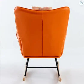 Vibrant orange upholstered rocking chair with a houndstooth-patterned cushion and black metal frame.