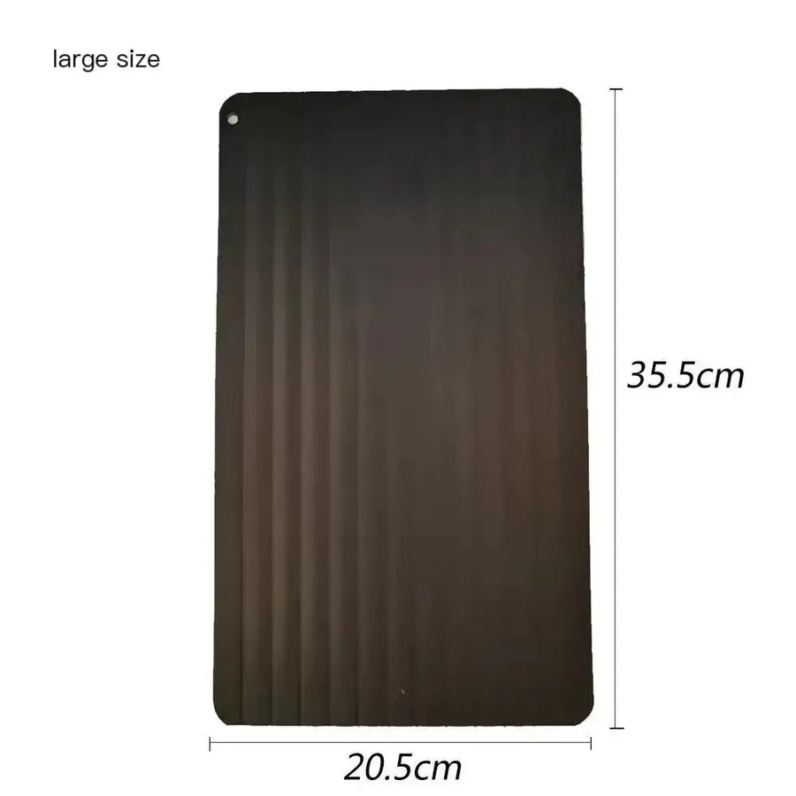 Black rectangular mat with vertical ribbed texture, measuring 35.5cm by 20.5cm in large size.