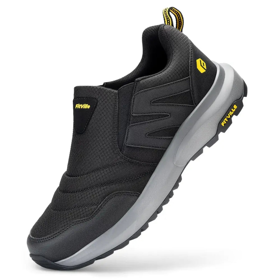 Black fitville slip-on sneaker with gray midsole and yellow branding accents.