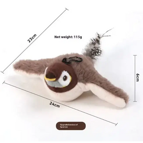 A plush penguin-shaped keychain with brown and white fur, a yellow beak, black eyes, and feathered tail.