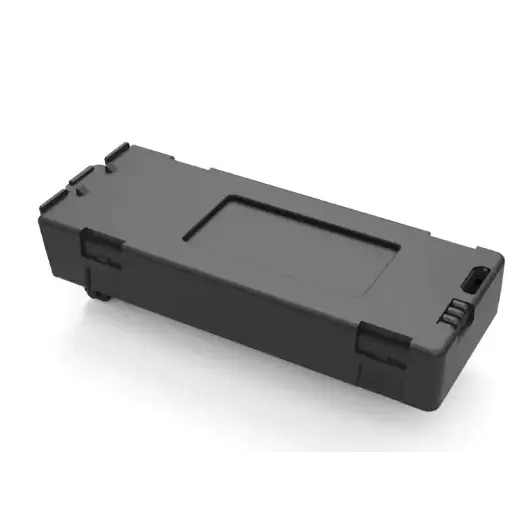 Black plastic drone battery with reinforced corners and a rectangular cutout on the top surface.
