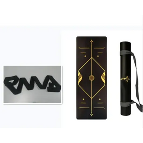 Black yoga mat with gold geometric patterns and a central circular design, rolled in a matching black carrying tube.