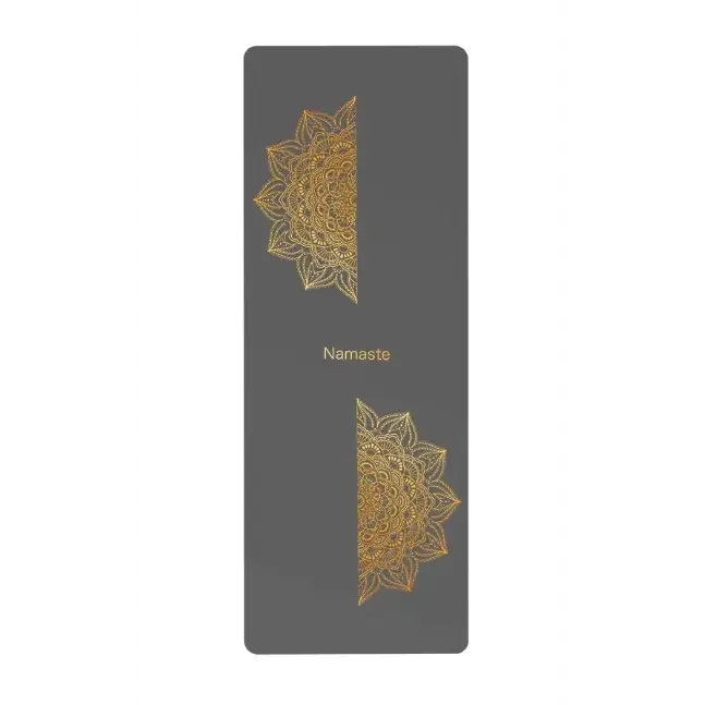 Dark gray yoga mat featuring intricate gold mandala designs on either side and the word ’namaste’ printed in a matching gold font.