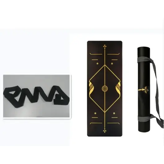 Black yoga mat with gold geometric and floral designs, rolled in a matching black carrying tube.