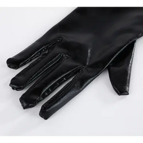 Black, glossy faux leather gloves with a sleek and elegant design.