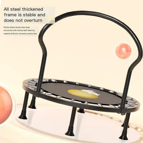 Black steel-framed mini trampoline with a yellow circular mat featuring a white bunny design.