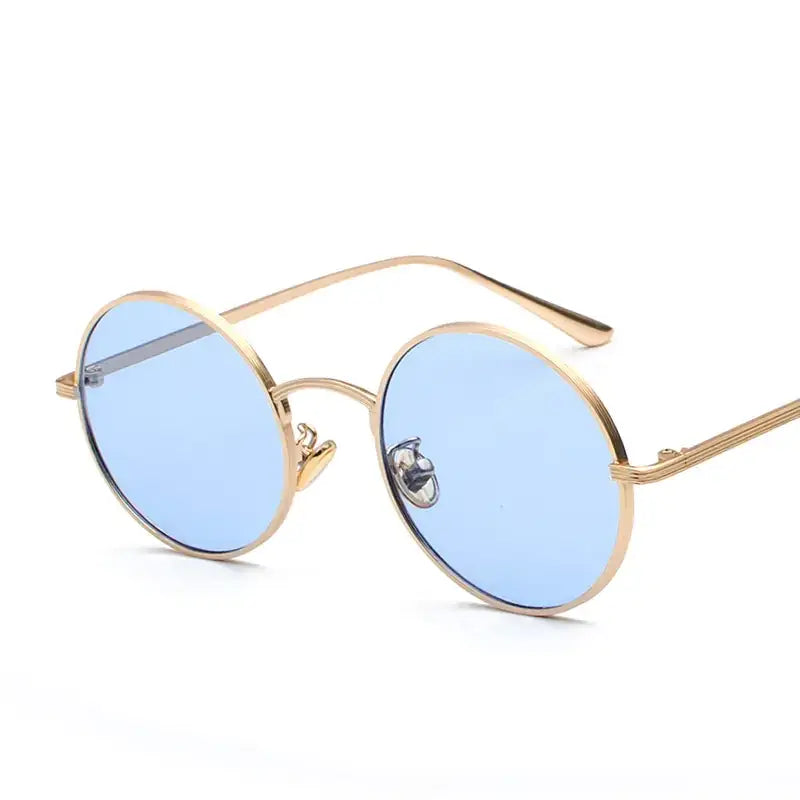 Gold-toned round sunglasses with light blue tinted lenses.