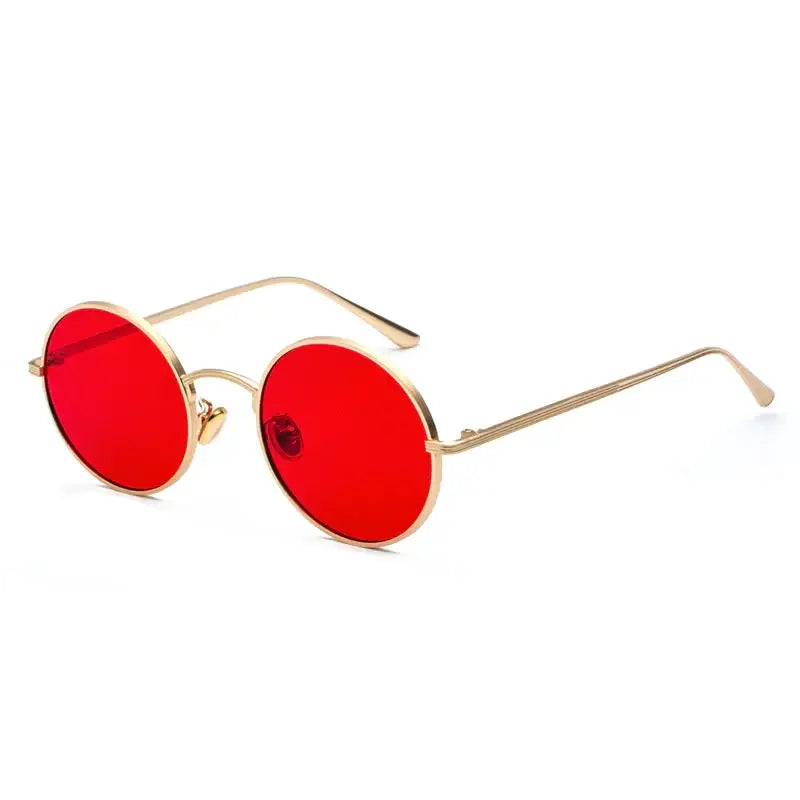 Gold-rimmed round sunglasses with vibrant red lenses.