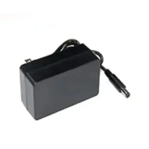 Black rectangular power adapter with a coiled cable and cylindrical connector.