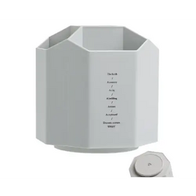 White octagonal desk organizer with a minimalist design and engraved text on its side.