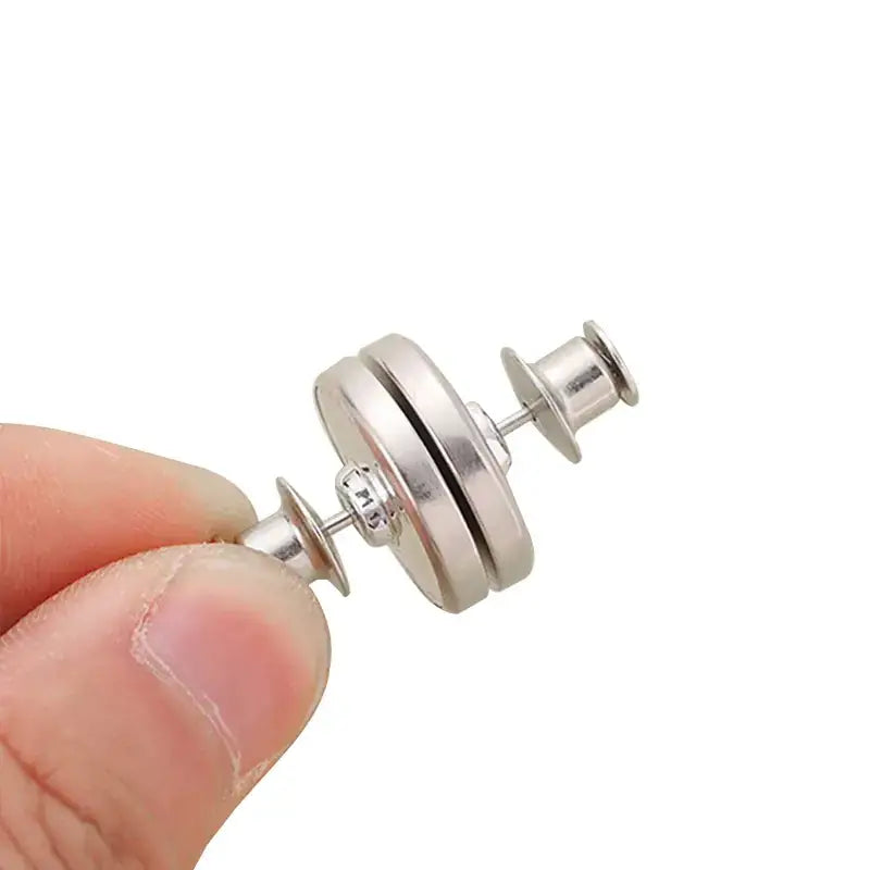 Silver magnetic closure with two circular discs and a central pin mechanism