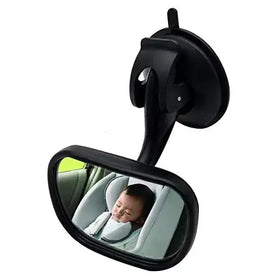 Black suction-cup mounted car rearview mirror with a curved reflective surface showing a sleeping child in a seat.