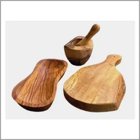 Handcrafted olive wood mortar and pestle set with a smooth, natural finish.