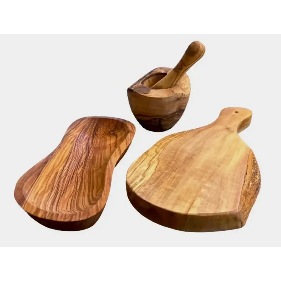 Handcrafted olive wood mortar and pestle set with natural grain patterns.
