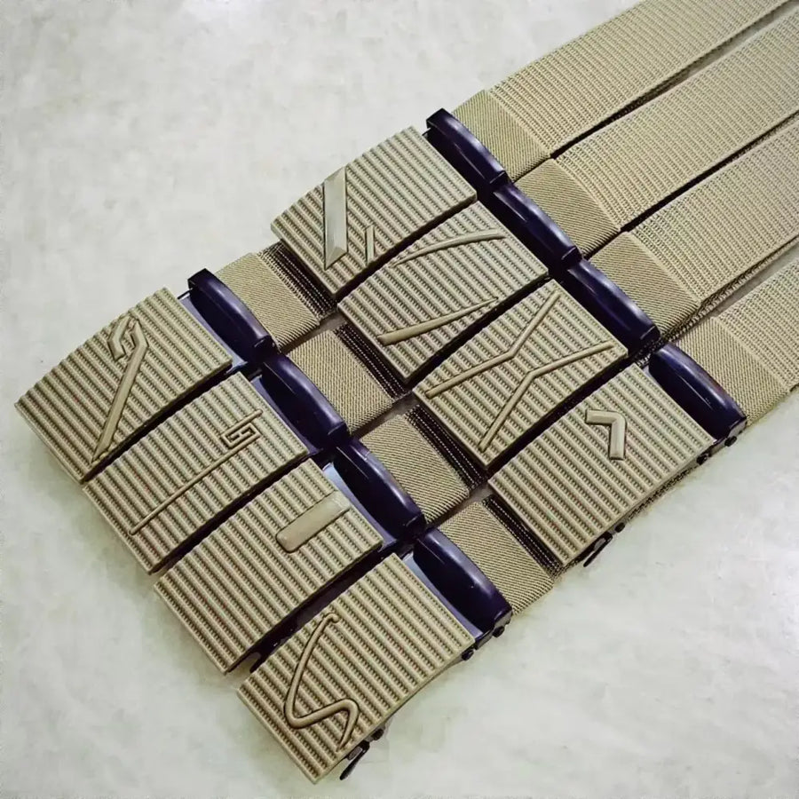 Tan woven belt with a dark blue plastic buckle and embossed geometric patterns.