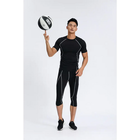 Black athletic compression suit with white seam detailing