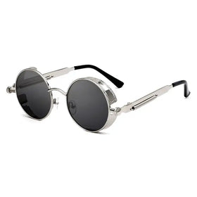 Stylish silver-framed round sunglasses with dark gray lenses and black temple tips.