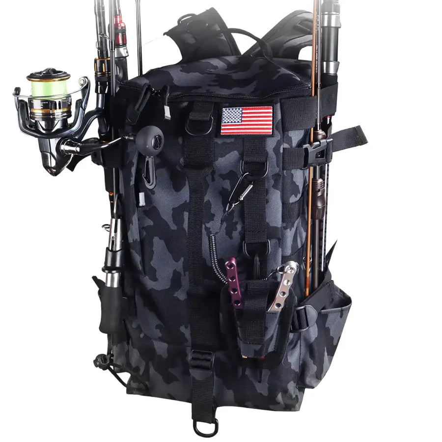 Black and gray camouflage fishing backpack with american flag patch, multiple straps for gear organization.